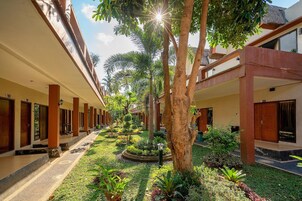 Habitación superior con 2 camas individuales, vistas al jardín | Jardines del alojamiento