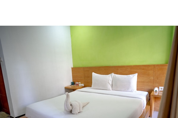 Superior Double Room, Air conditioning, Garden View | WiFi (free), bed sheets