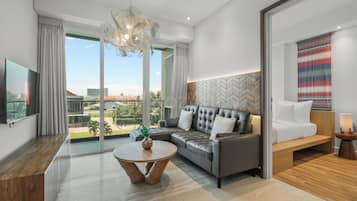 Apartment, 2 Bedrooms, Balcony, City View | Living area | 43-inch plasma TV with cable channels, Netflix, streaming services