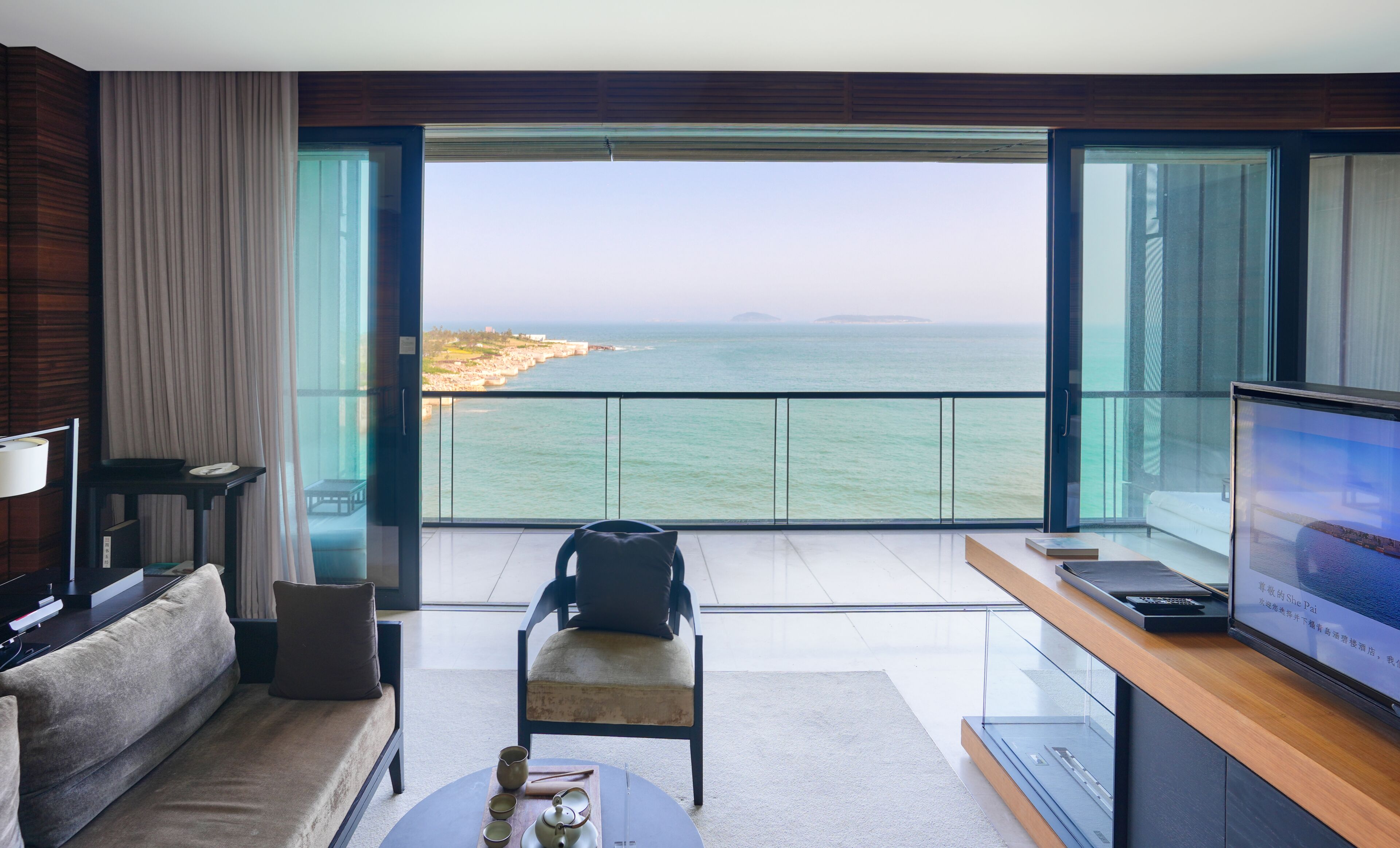 Chambre avec lits jumeaux, balcon, vue mer | Coin séjour