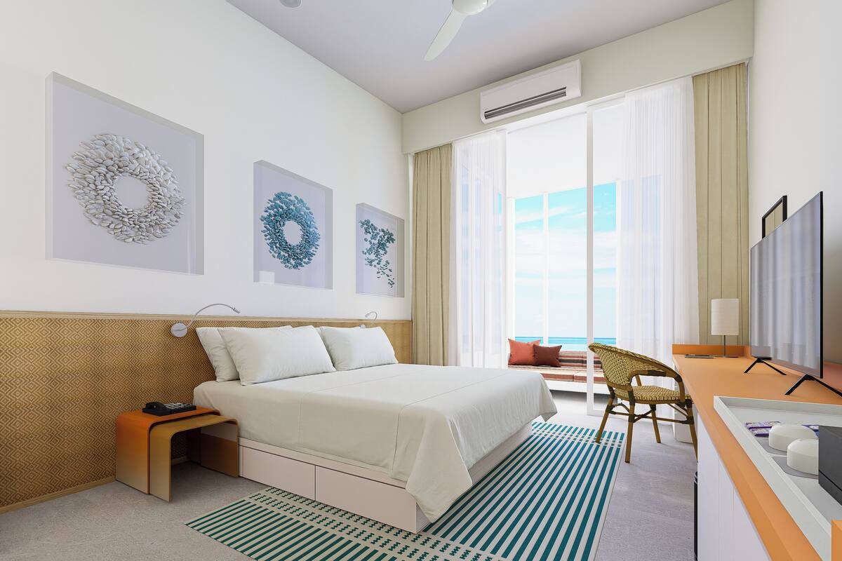 Villa familiar, vista al mar | Edredón, minibar, caja de seguridad en la habitación y escritorio 