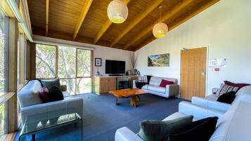Superior Chalet, Balcony, Mountain View | Living area | 60-cm TV with digital channels, Netflix, toys