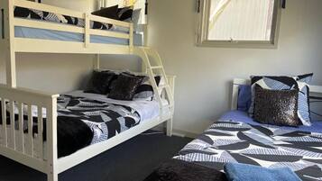 Blackout curtains, iron/ironing board (on request), cots/infant beds