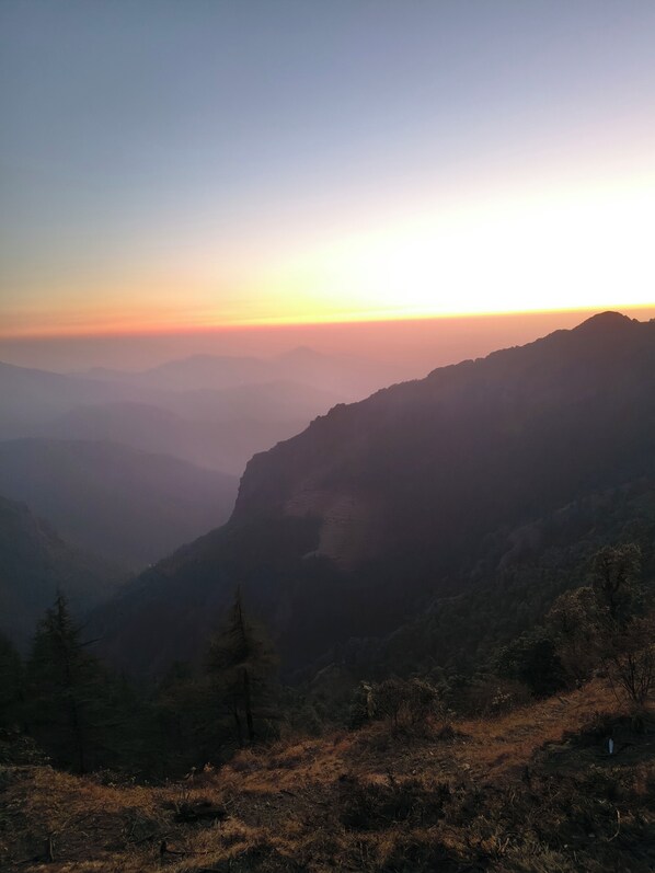 A mountainous landscape with a clear sky.