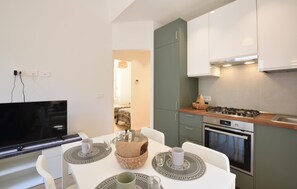 Fridge, stovetop, cookware/dishes/utensils
