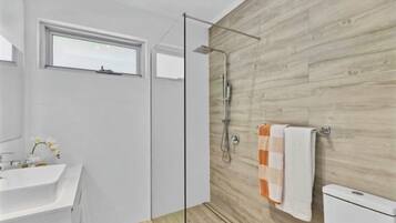 Shower, hair dryer, towels, soap