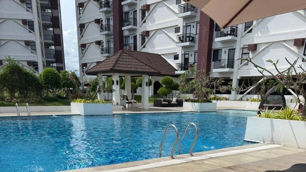 Pool - Serene 1-Bedroom Apartment with Pool Access in Lapu-Lapu (Lapu-Lapu)