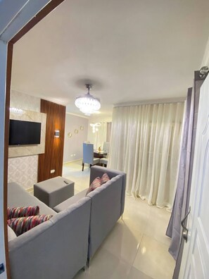 Living area - Apt 5 Stars, AC, WiFI, Free Parking, under Haina RD (Bajos de Haina)