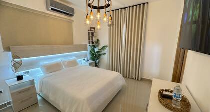 Luxury 2-bedroom condo with AC in charming Caleta, minutes away from the beach!