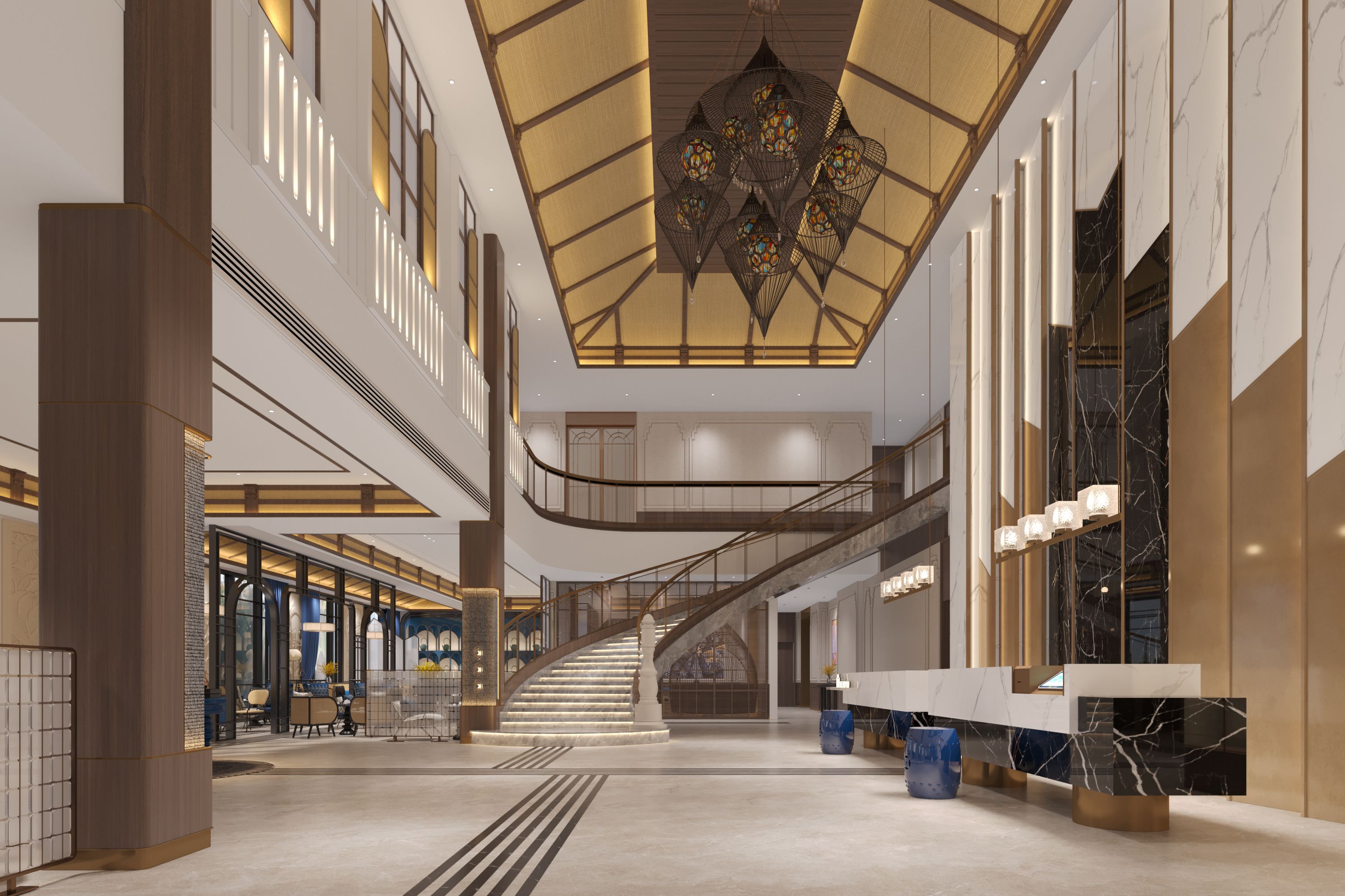 A spacious lobby with a central staircase, high ceilings, and modern lighting fixtures.