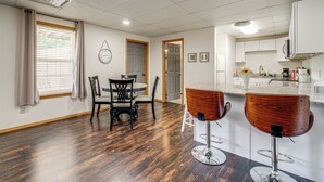 A modern kitchen with white cabinets, a stainless steel refrigerator, and a countertop with a coffee maker. - 8 Mi to Nat'l Military Park: Rural Pea Ridge Base (Pea Ridge)