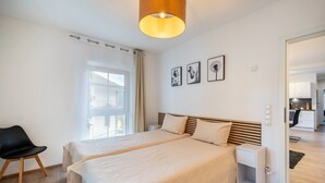 2 chambres, fer et planche à repasser, Wi-Fi, draps fournis