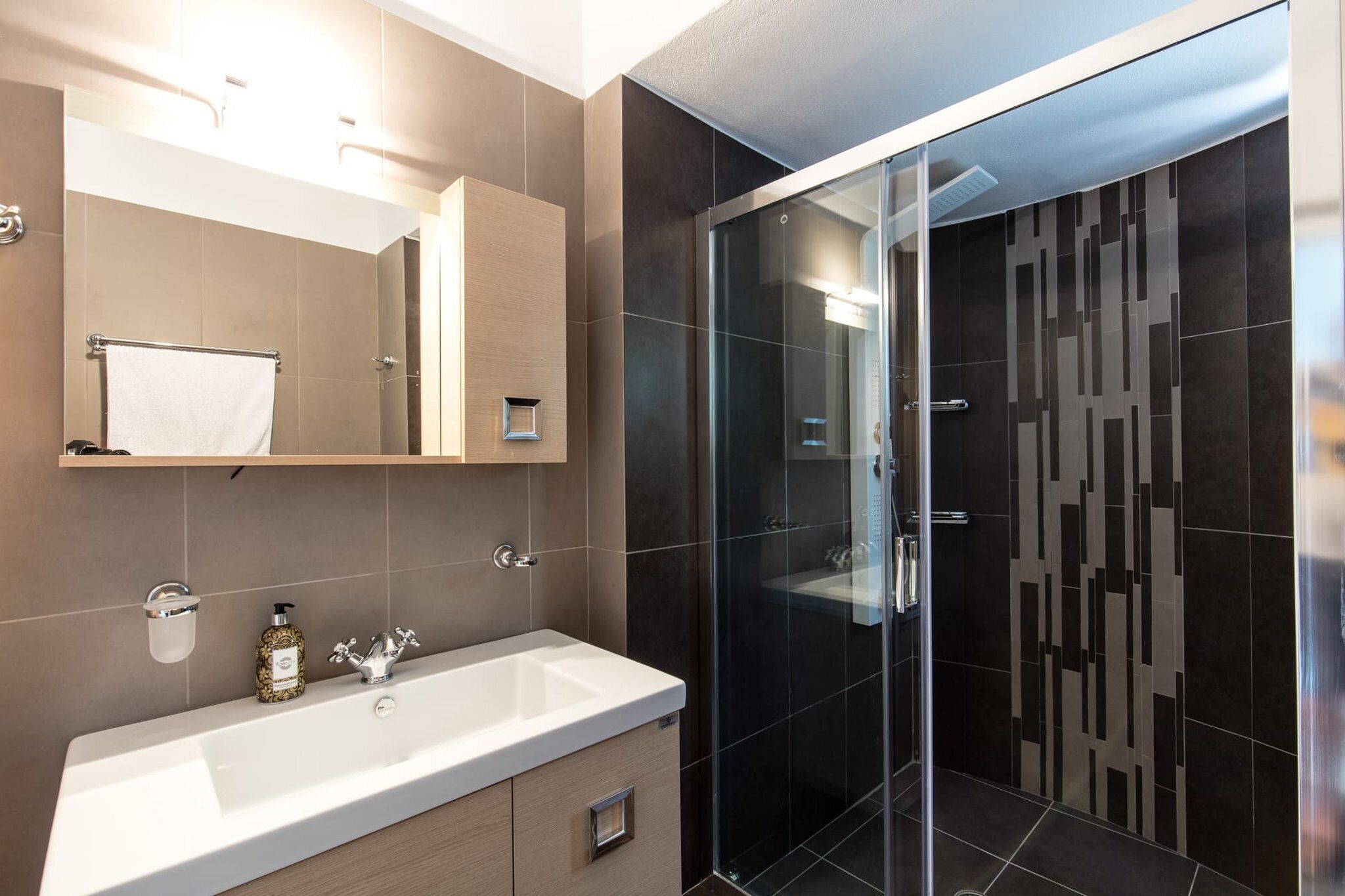 Shower, towels, soap, shampoo
