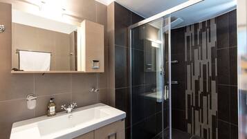 Shower, towels, soap, shampoo
