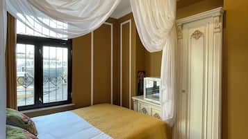 Basic Double Room, Courtyard View | In-room safe, desk, laptop workspace, blackout drapes