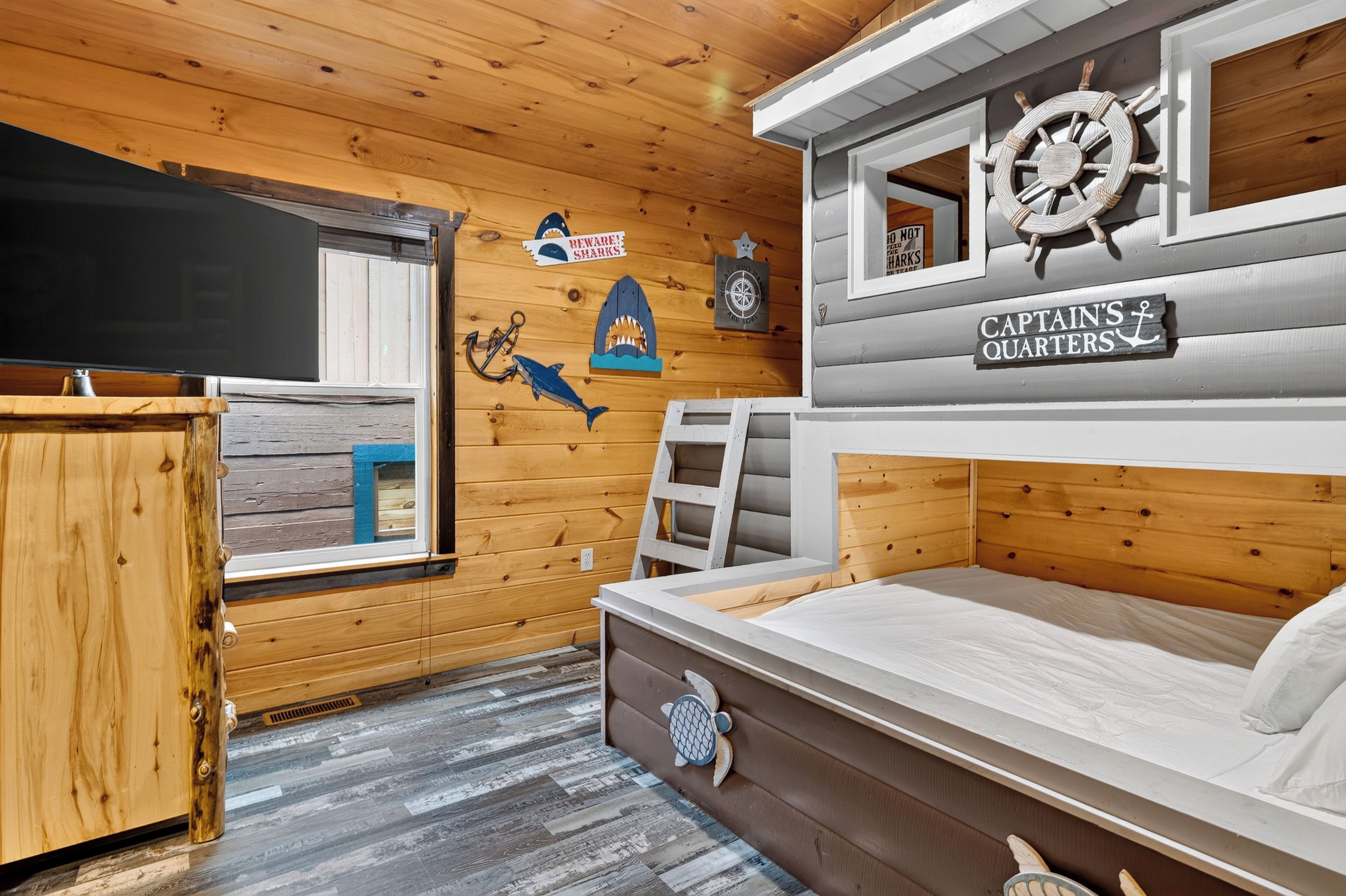Bedroom 9 features a twin-over-king bunk bed.