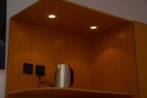 Suite Studio Deluxe, vue jardin | Café et/ou machine à café