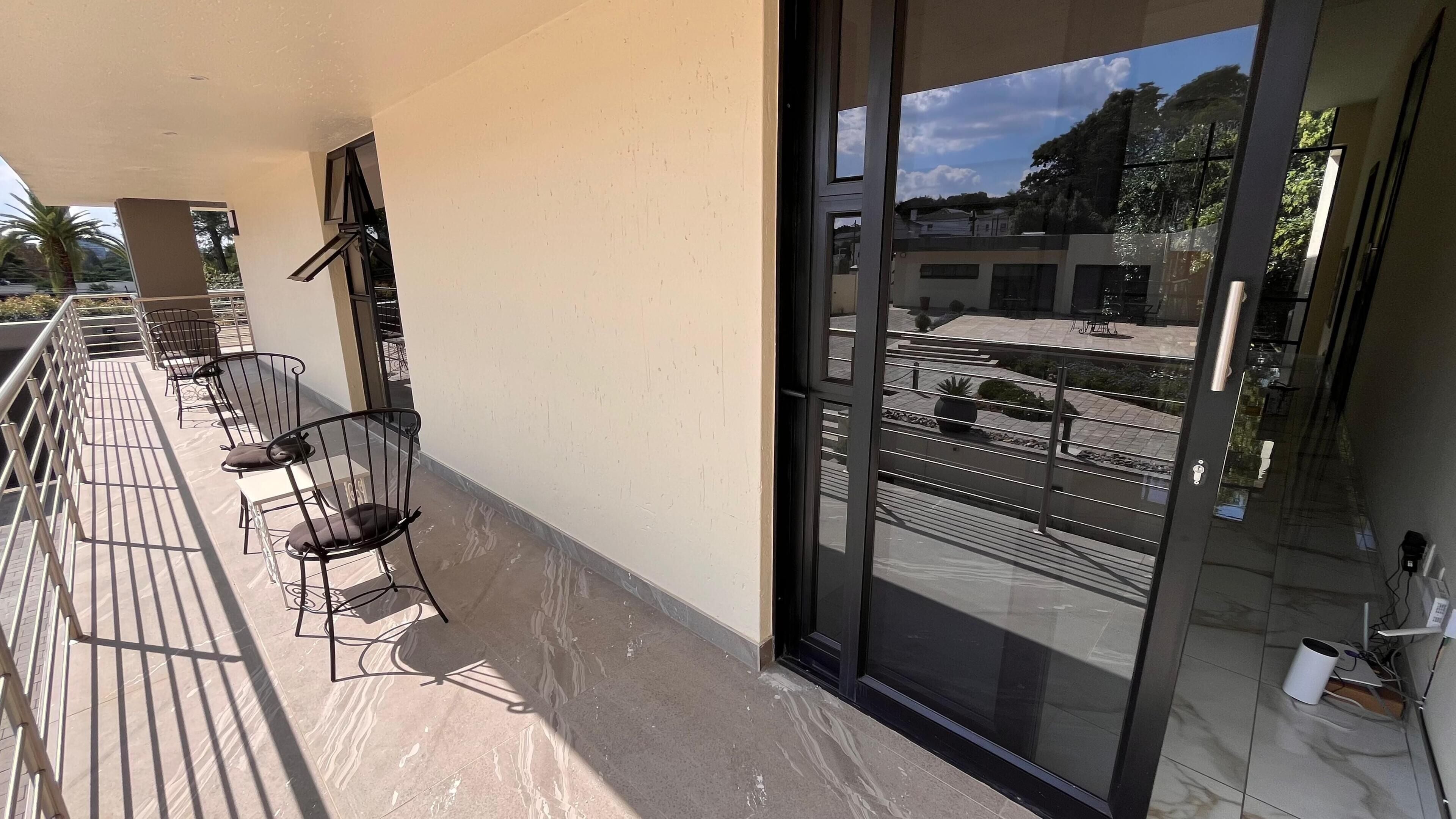 Comfort Room, Multiple Beds, Balcony, City View | Terrace/patio