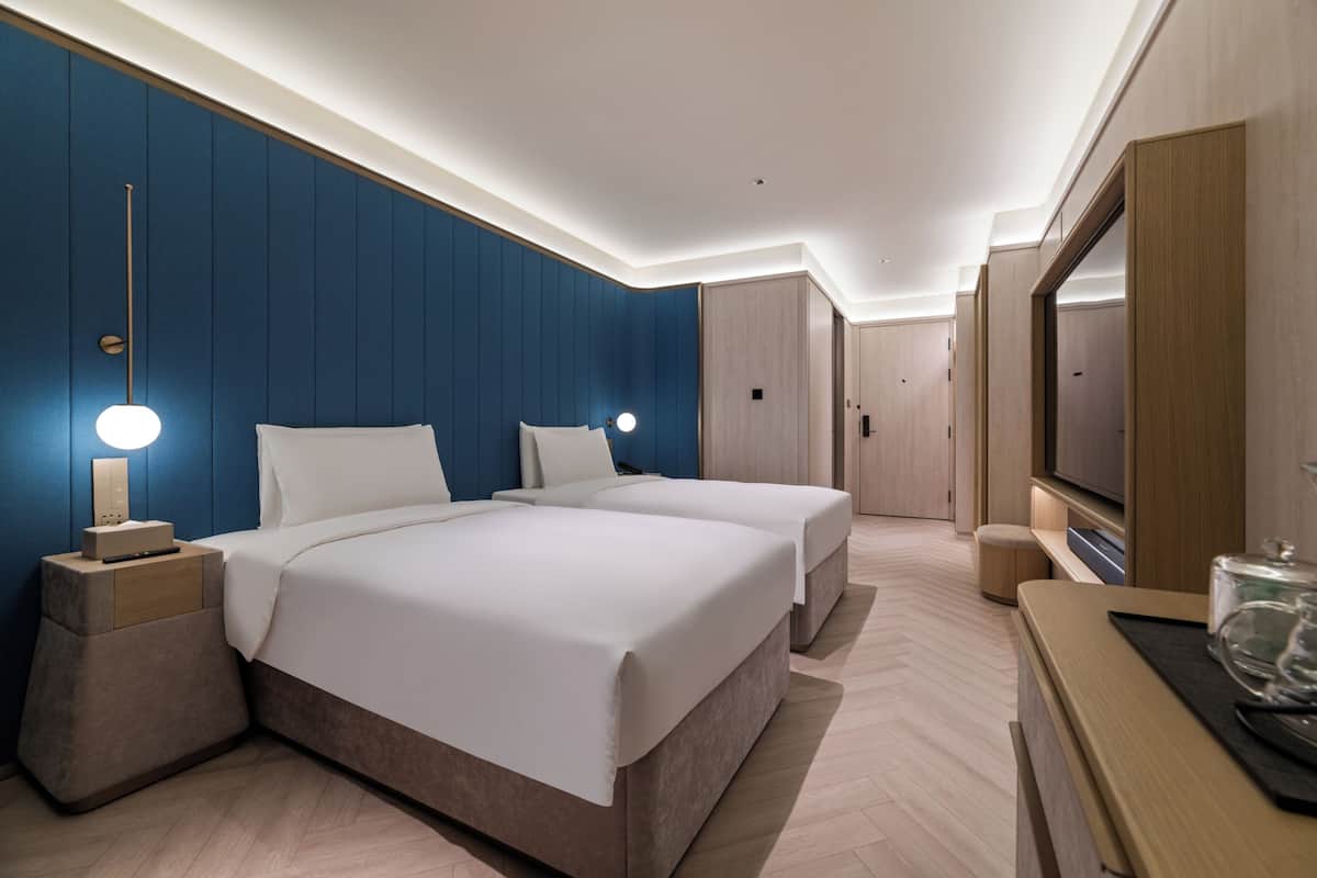 Executive Twin kamer | Verduisterende gordijnen, een strijkplank/strijkijzer, gratis wifi