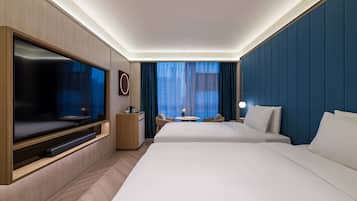 Quarto duplo executivo | Frigobar (abastecido com itens grátis), cortinas blackout