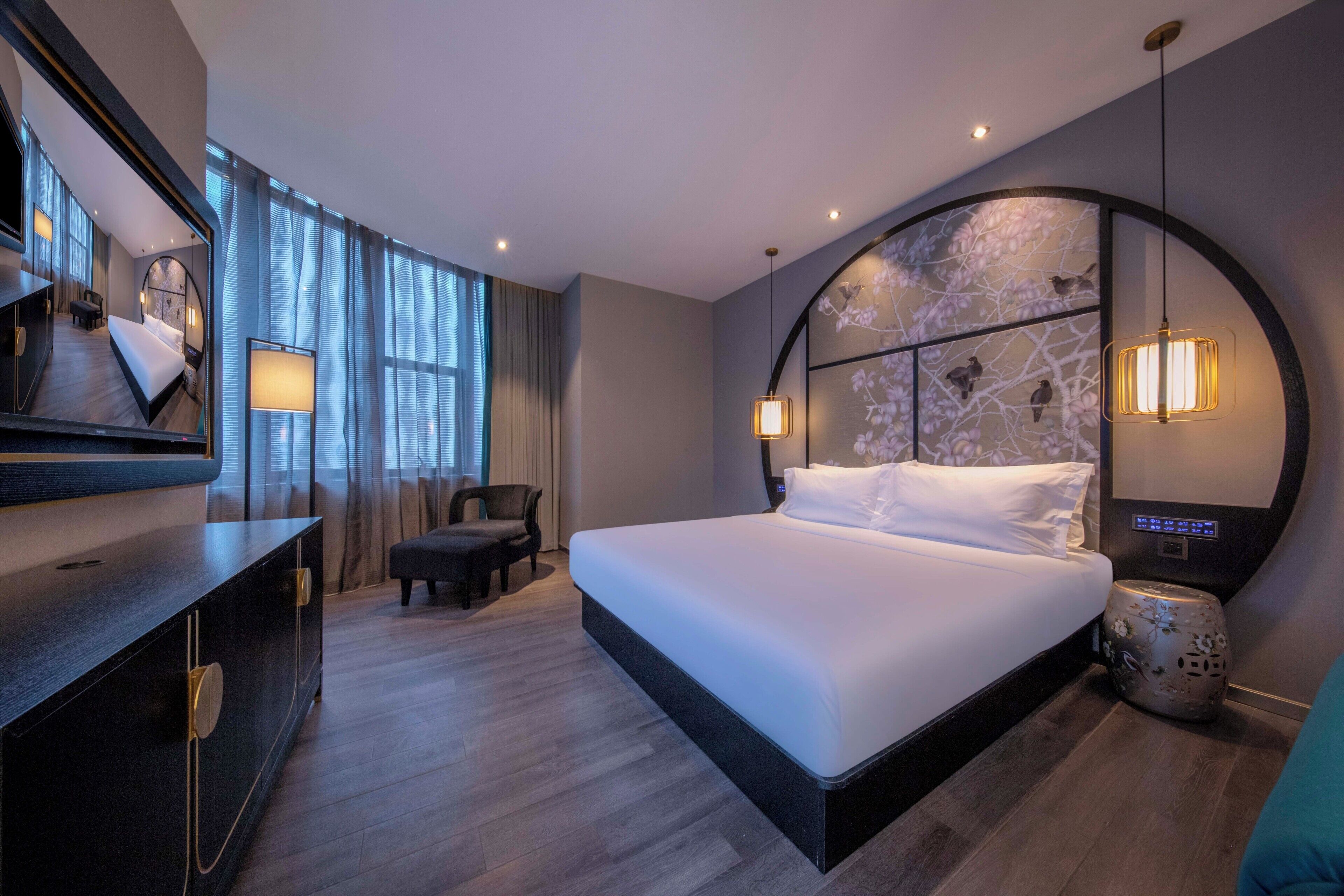 Suite, City View | Down comforters, minibar (free items), in-room safe, desk