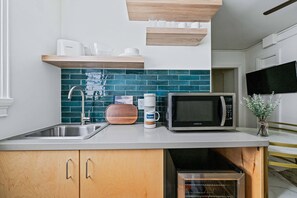 Coffee/tea maker, microwave, cookware/dishes/utensils, dining tables - Sabel #203 | Downtown Asheville king-suite condo with Wi-Fi, AC, and parking. (Asheville)