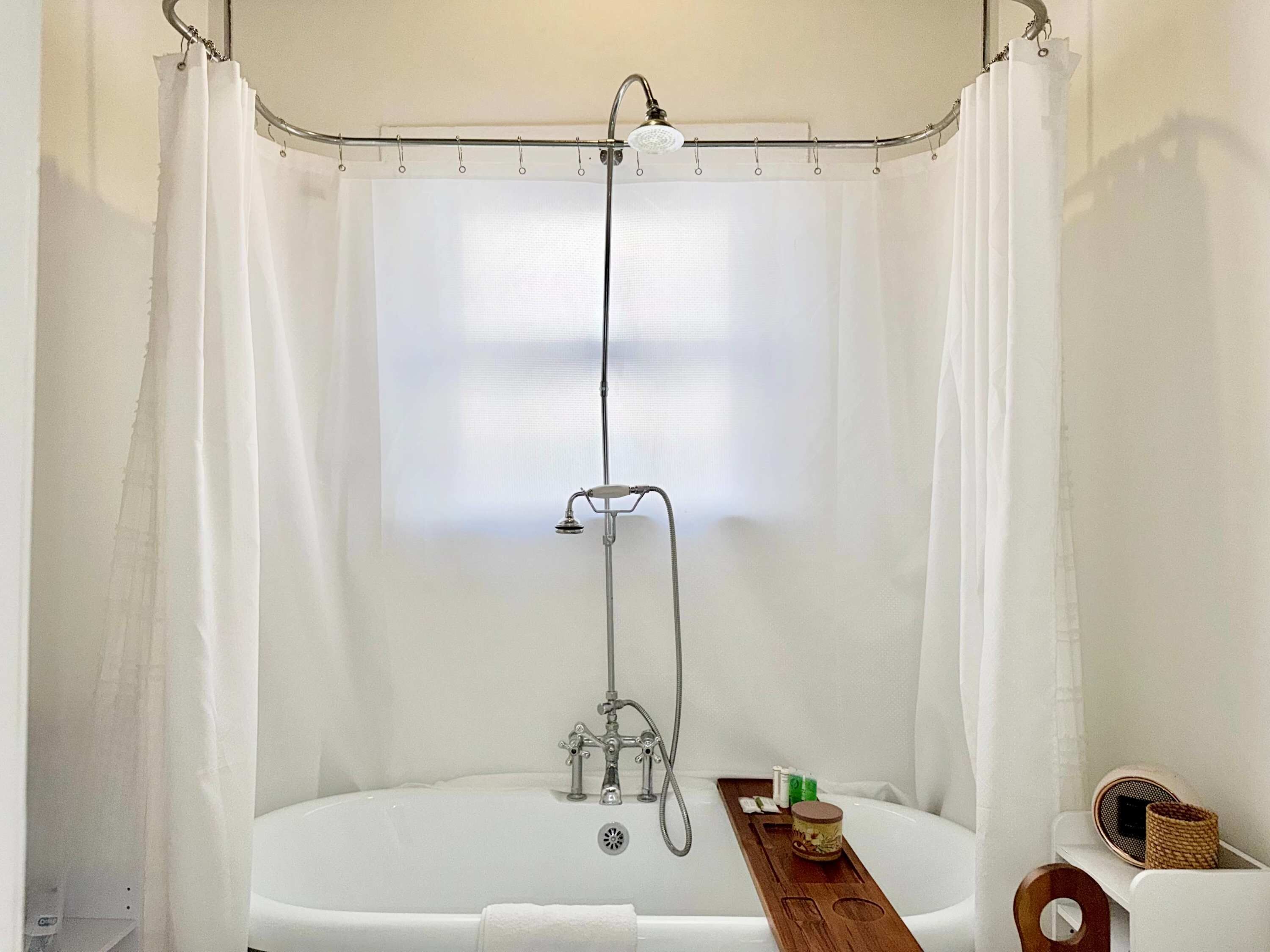 Shower, hair dryer, towels, shampoo