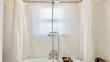 Shower, hair dryer, towels, shampoo