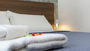 Townhome, Balcony, City View | In-room safe, desk, laptop workspace, blackout drapes