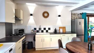 Coffee/tea maker, fridge, microwave, oven