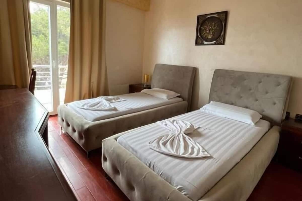 Standard Twin Room, Balcony, Sea View | In-room safe, desk, blackout drapes, WiFi (free)