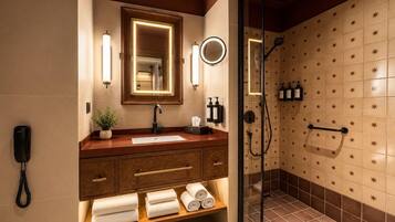 Shower, hair dryer, slippers, towels
