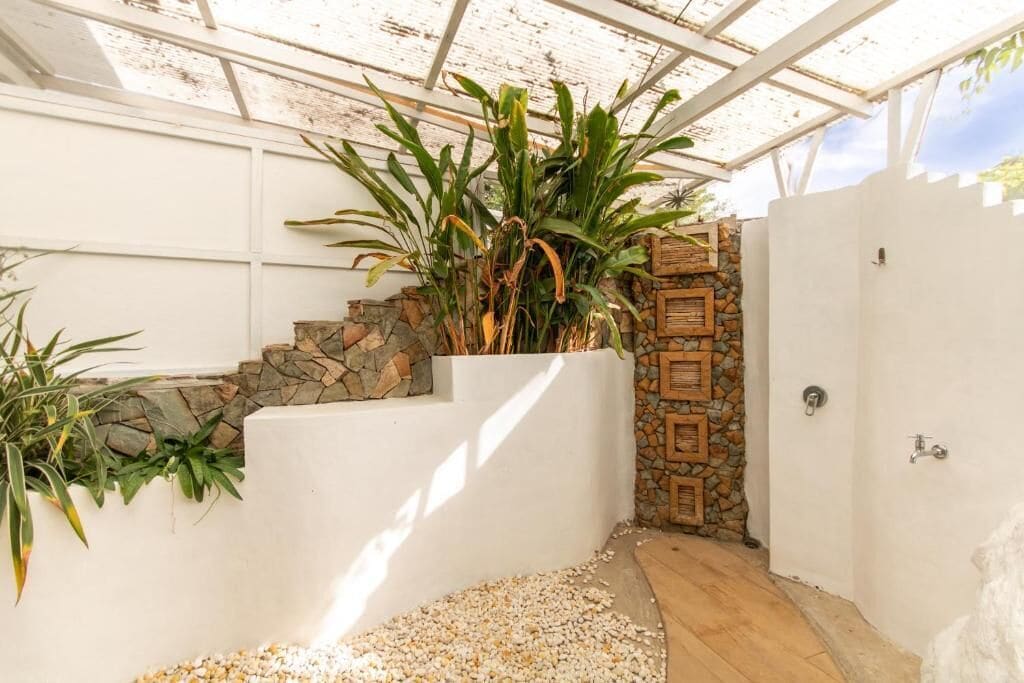 Junior Suite, 1 King Bed, Balcony, Pool View | Property grounds