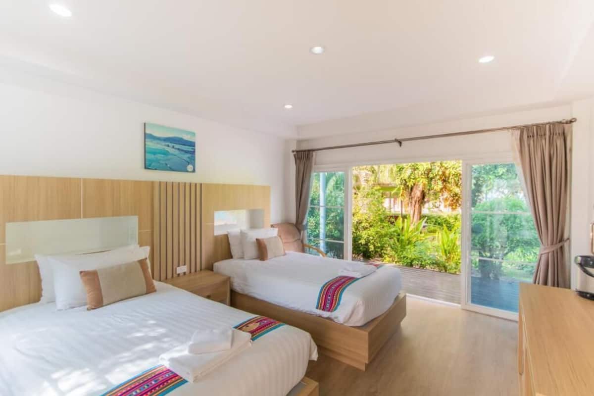 Suite junior, 2 camas individuales, no fumadores, vistas a la piscina | Caja fuerte y wifi gratis