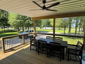 Outdoor dining - Newly remodeled 5BR farmhouse in Coloma, just 8 minutes to Lake Michigan beach. Enjoy 3,000 sq ft, 2 full baths, smart TVs in every bedroom, a covered deck, large yard, and private balcony off the primary suite. (Coloma)