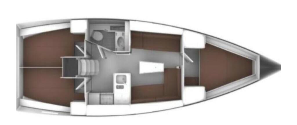 A boat interior with a dining area, a kitchen, and a bathroom.