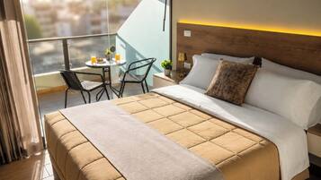 Junior suite, niet-roken | Luxe beddengoed, een minibar, een bureau, een laptopwerkplek