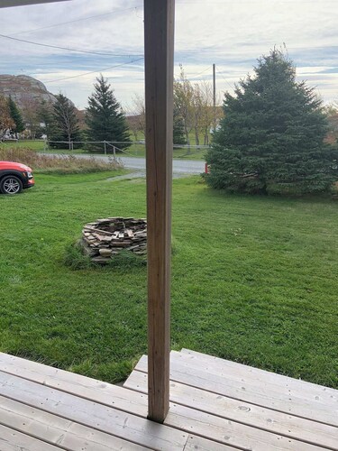 Escape to The Blue Bird – a cozy 2-bedroom cottage with hot tub and partial ocean views! Just 5 mins from Carbonear & 15 mins to Salmon Cove Sands.