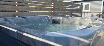 Escape to The Blue Bird – a cozy 2-bedroom cottage with hot tub and partial ocean views! Just 5 mins from Carbonear & 15 mins to Salmon Cove Sands.