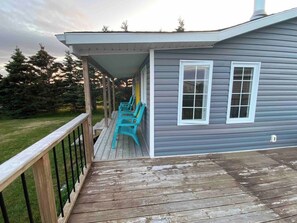 Terrace/patio - Escape to The Blue Bird – a cozy 2-bedroom cottage with hot tub and partial ocean views! Just 5 mins from Carbonear & 15 mins to Salmon Cove Sands. (Flat Rocks)