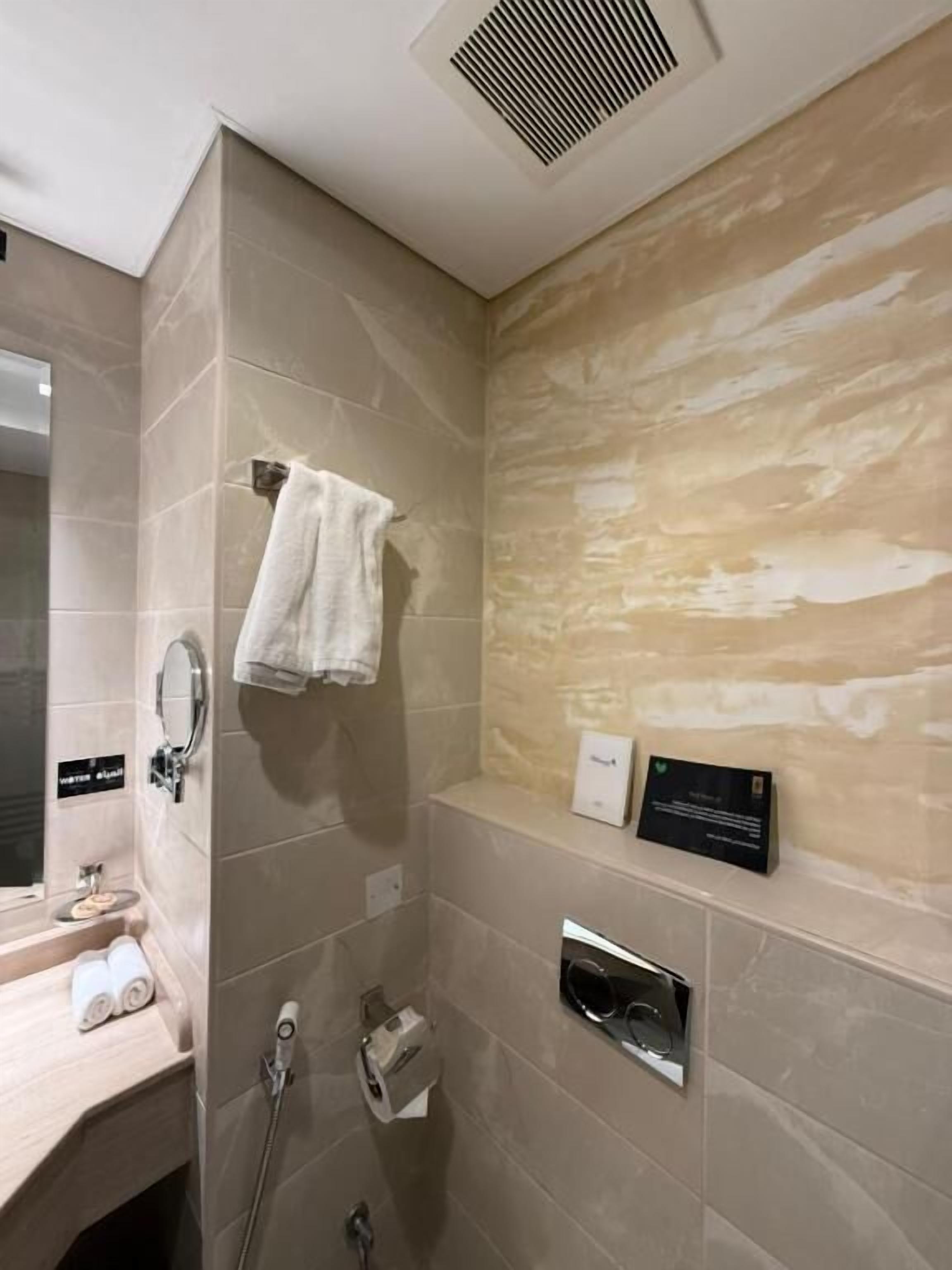 Shower, towels, soap, shampoo