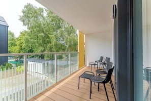 Apartamento Deluxe, baño privado, junto a la playa | Vistas al patio
