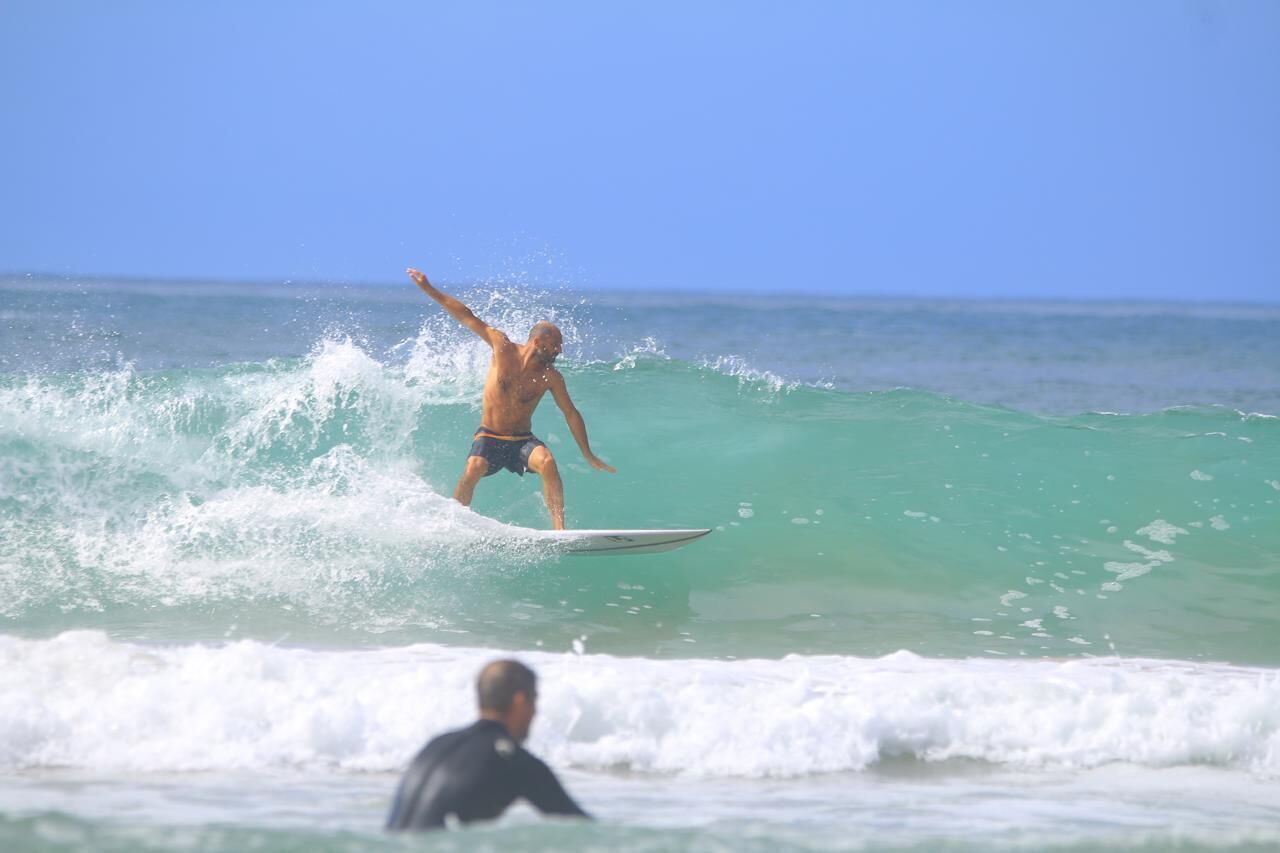 A person surfing on a wave.