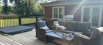 Redbird Waterfront Cottage with Dock and Hot Tub