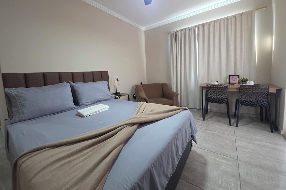 Comfort Double Room, Balcony, City View | Desk, blackout drapes, iron/ironing board (on request), WiFi (free)