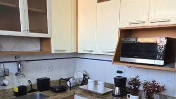 Comfort Double Room, Lanai, City View | Shared kitchen | Fridge, microwave