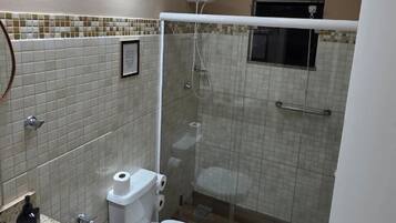 Shower, towels, toilet paper