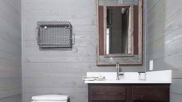 Shower, hair dryer, towels, shampoo