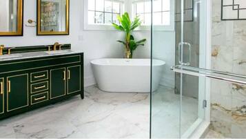 Shower, hair dryer, towels, shampoo