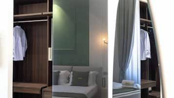 1 chambre, coffre-fort, fer et planche à repasser, lit de bébé portatif